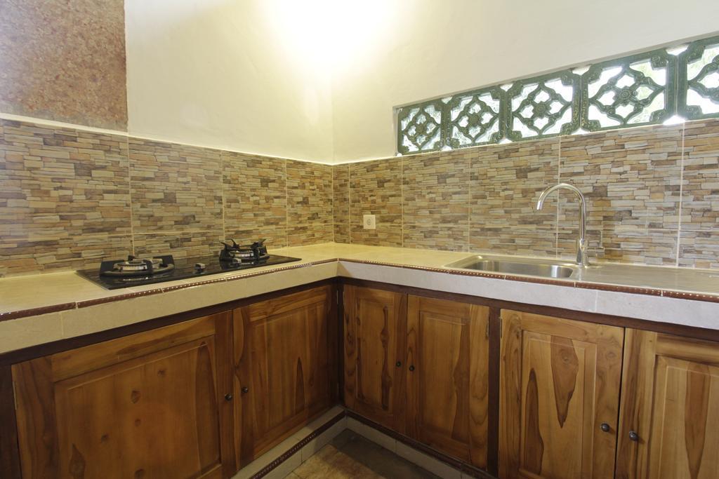 Pekak Mangku Guest House Убуд Номер фото